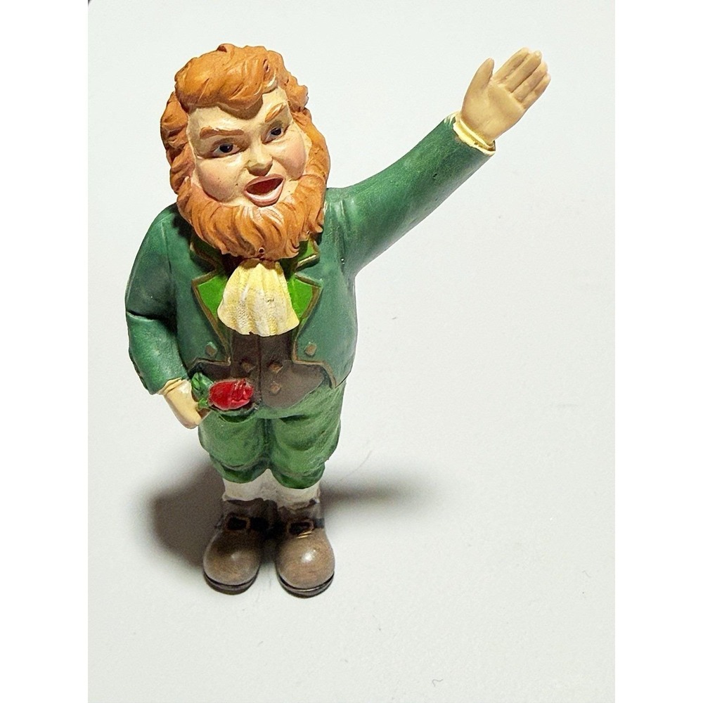 Vintage Leprechaun WMG2006 5" Tall. He Is Holding A Rose & Other Hand In Air